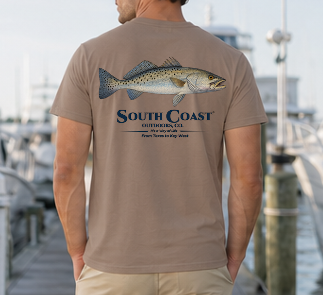 Taupe speckled trout fishing T-shirt, back fish graphic with South Coast Outdoors logo.