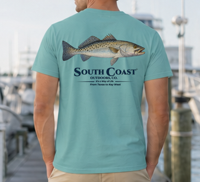 Seafoam speckled trout fishing T-shirt, back fish graphic with South Coast Outdoors logo.