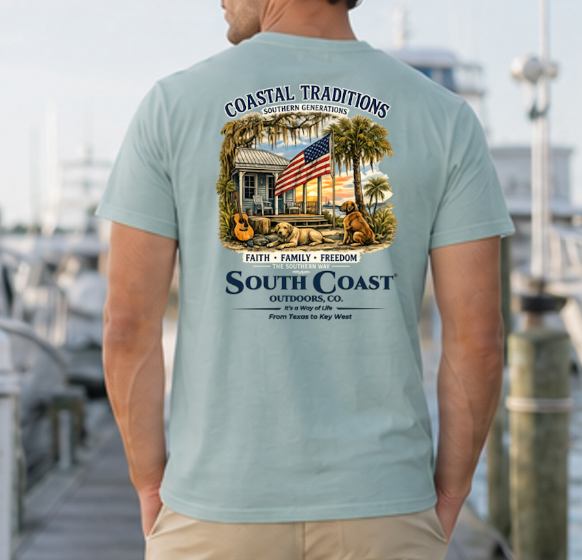 Light teal crewneck T-shirt with back graphic featuring palms, house, and “South Coast”
