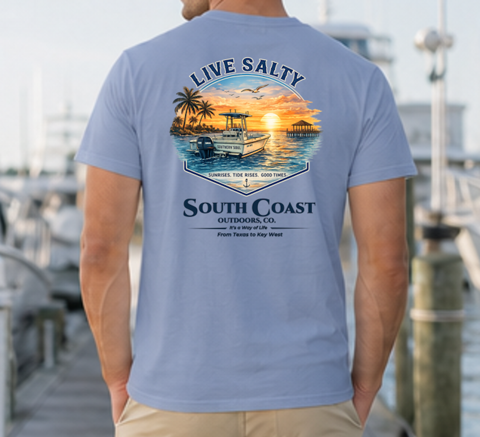 Dusty blue graphic t-shirt with sunset boat and palm print, 'Live Salty' text on back