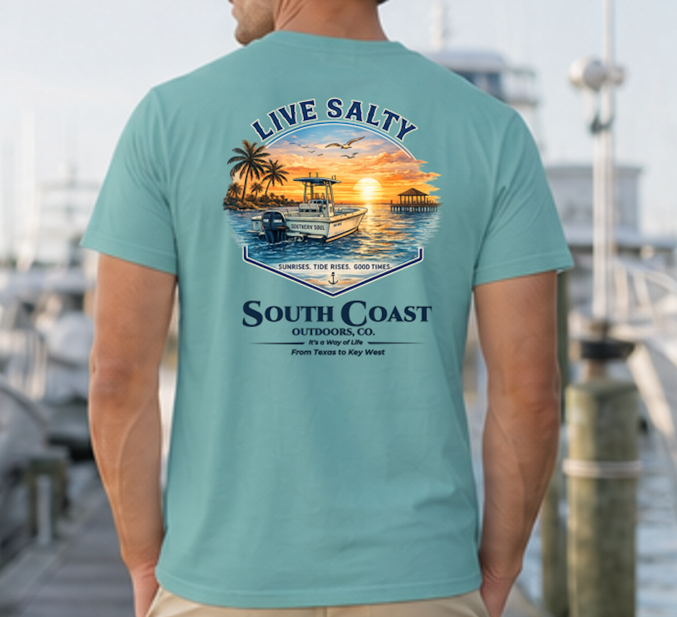Turquoise graphic t-shirt with sunset boat and palm print, 'Live Salty' text on back