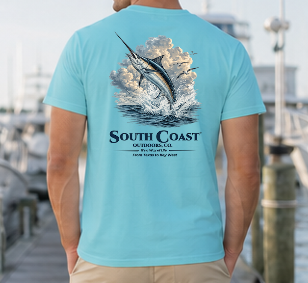 Fishing graphic t-shirt, turquoise with marlin in waves and South Coast Outdoors Co text.
